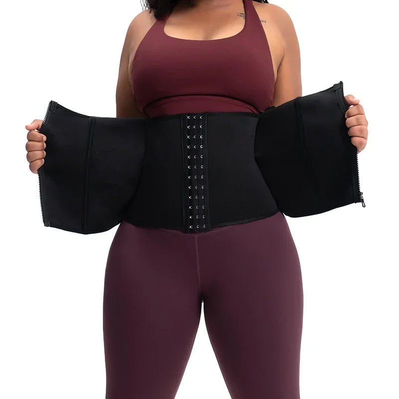Black body shaping waist trainer held open showing hook-and-eye closure and interior construction – REYVA